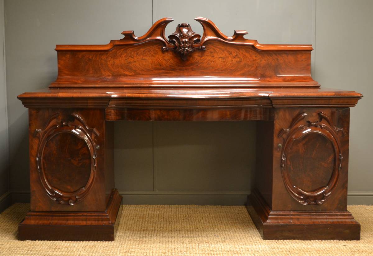 Pedestal Sideboard with ‘Green Man’ decoration.