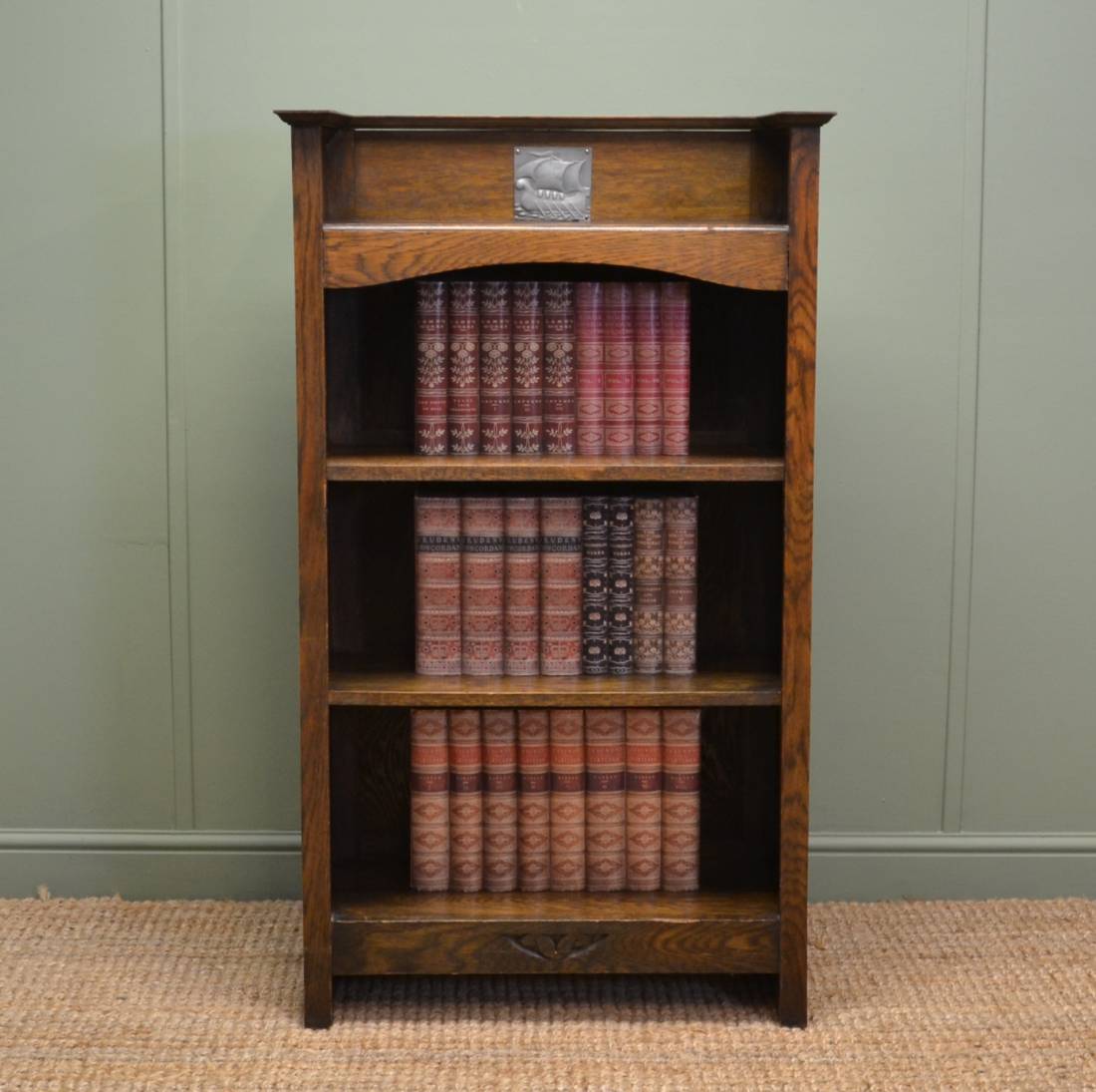 Edwardian Open Bookcase with unusual central plaque.