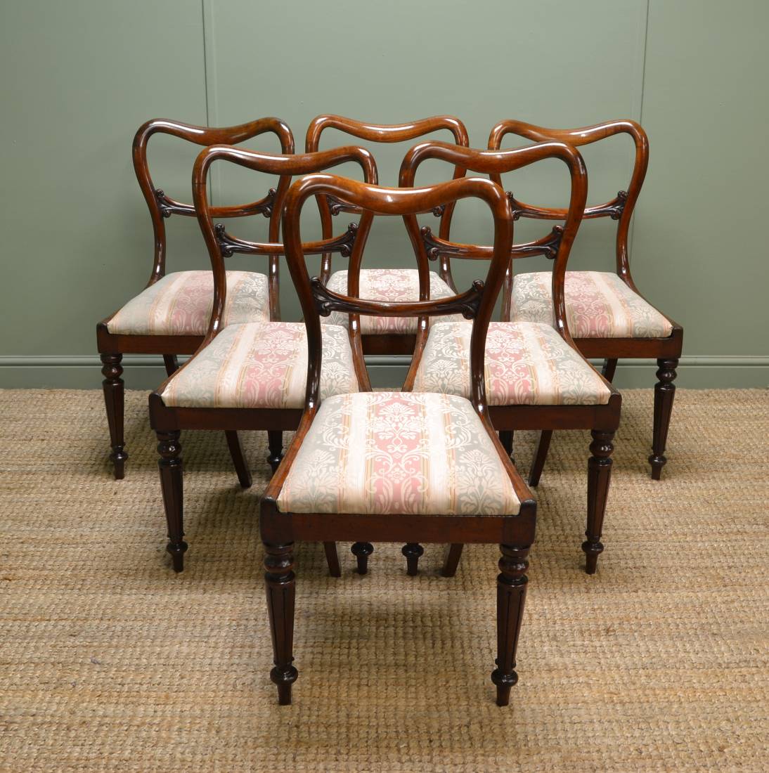 William IV Mahogany Antique Balloon Back Chairs with tulip design carvings. 