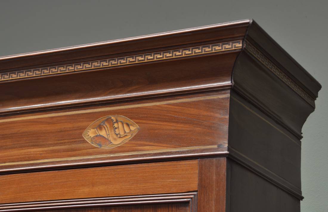 Inlaid shell on Antique Cupboard