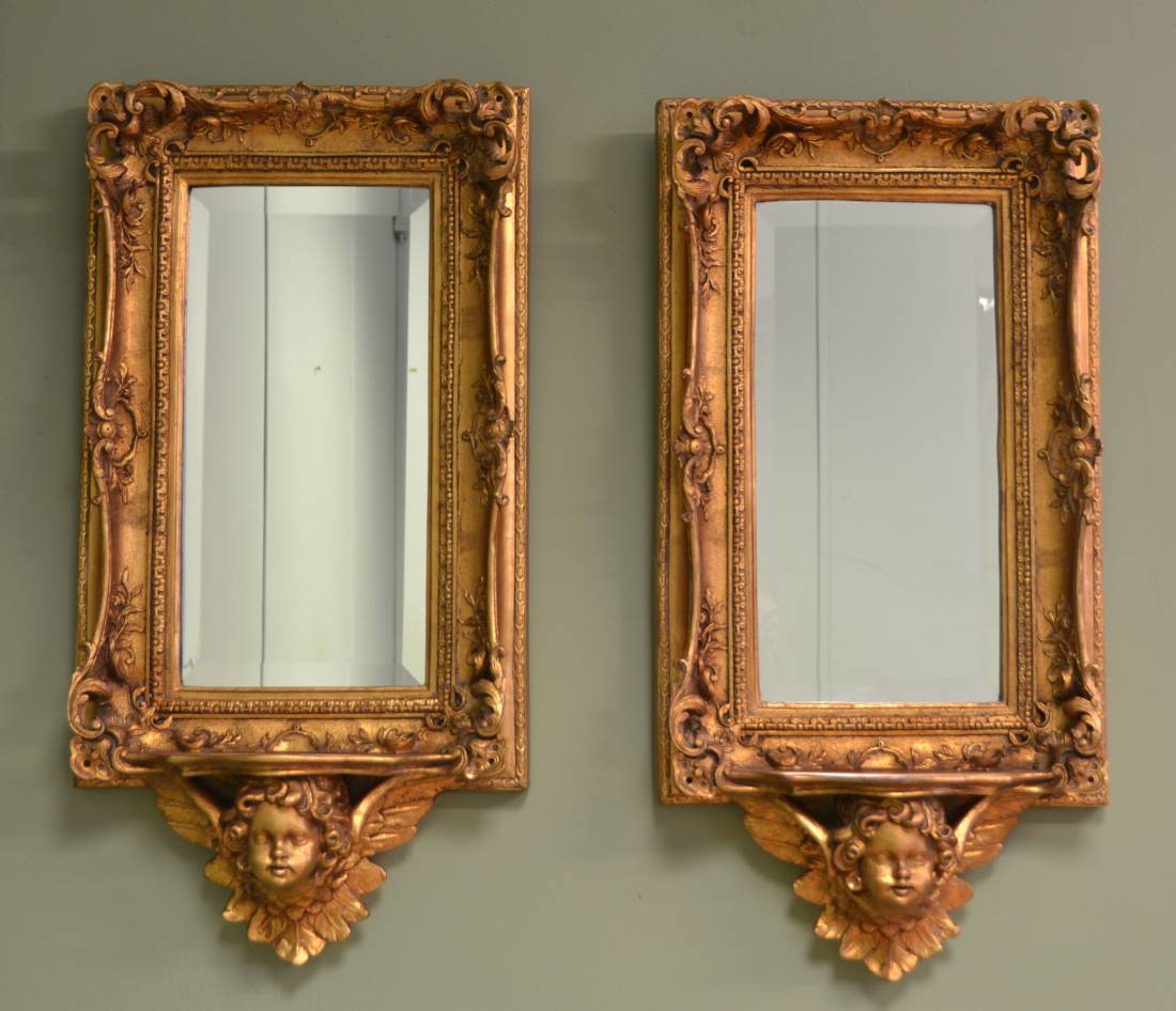 Pair Of Antique Decorative Cherub Gilt Mirrors