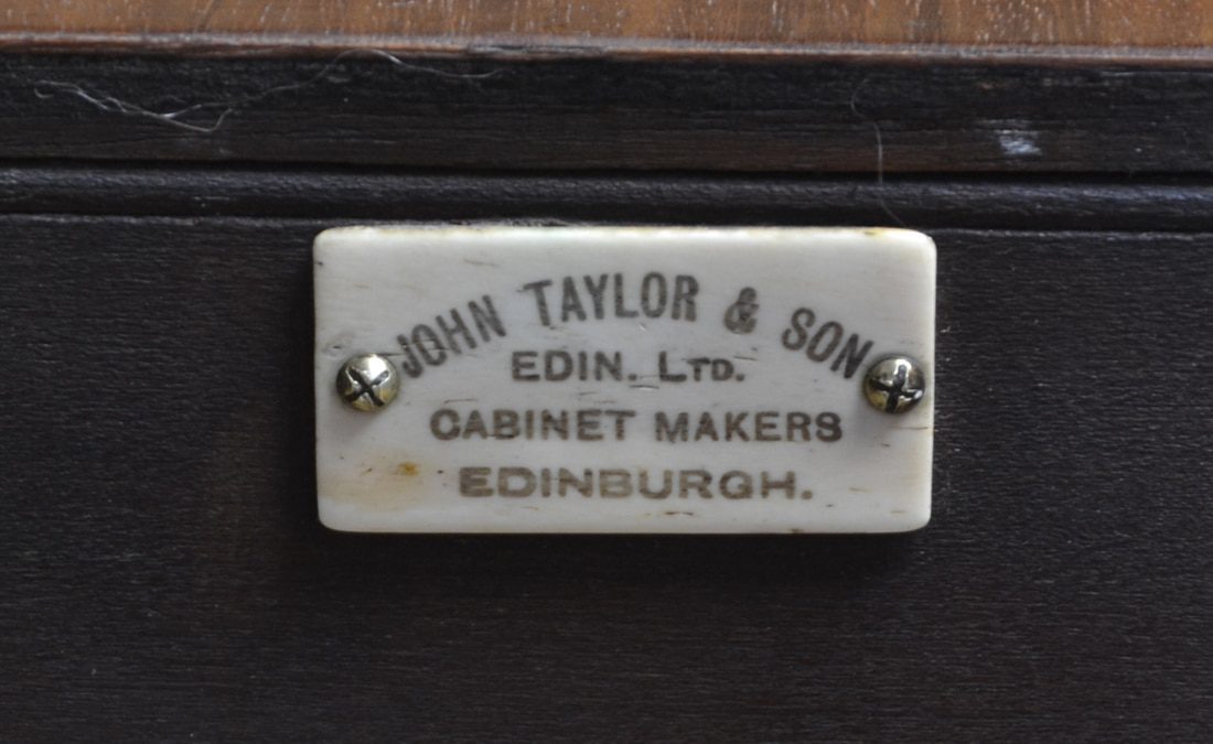 John Taylor Badge