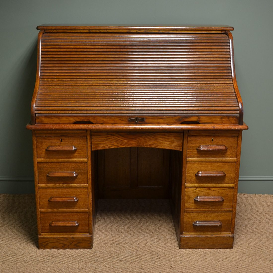 Tall Large Antique Roll Top Desk dates from ca. 1900 and is full of beautiful charm and character