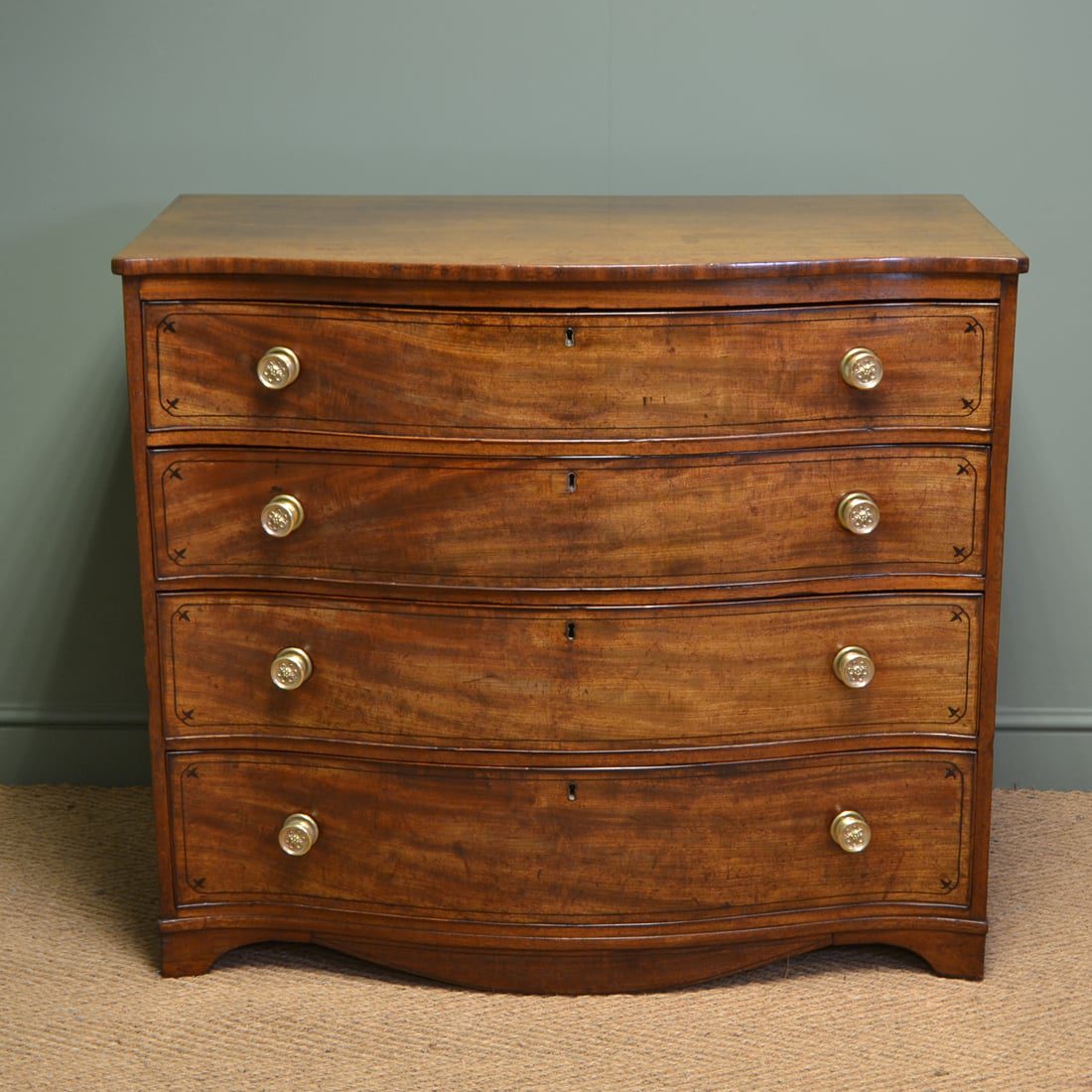 Serpentine Shaped Antique Chest Of Drawers