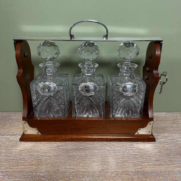 Stunning Mahogany Tantalus with Gin, Whiskey & Brandy Silver Decanter Labels