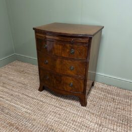 Quality Small Bow fronted Antique Chest with Brushing Slide