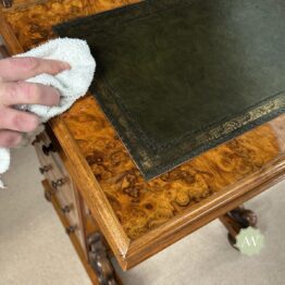 Polishing wood with wax