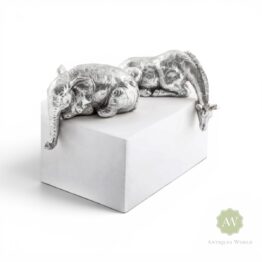 Silver Giraffe & Elephant Peering Over Figures