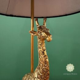 Antiqued Gold Giraffe Table Lamp with Black Shade Lifestyle