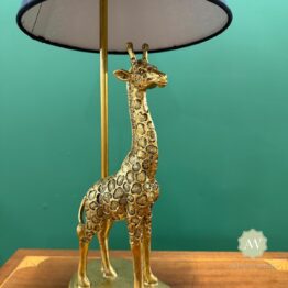 Antiqued Gold Giraffe Table Lamp with Black Shade Lifestyle